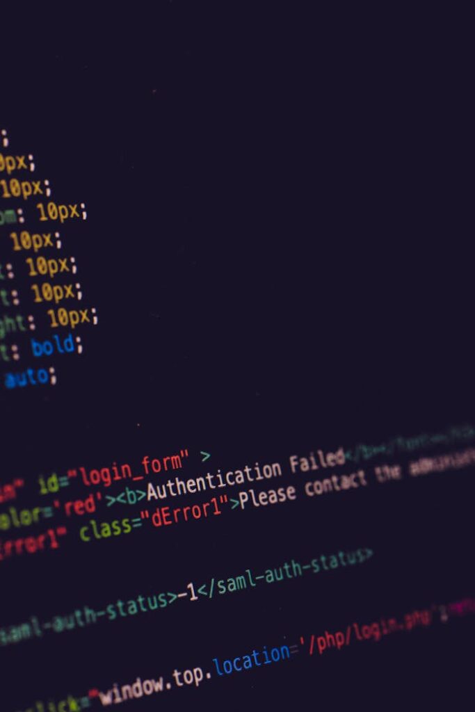 Close-up of programming code on a dark screen, highlighting software development concepts.